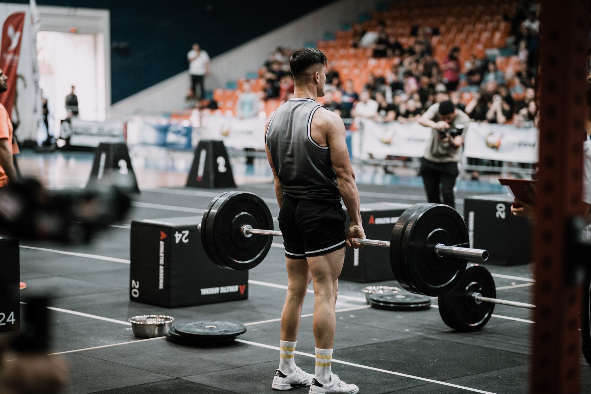 A member mid-lift during a coached strength session